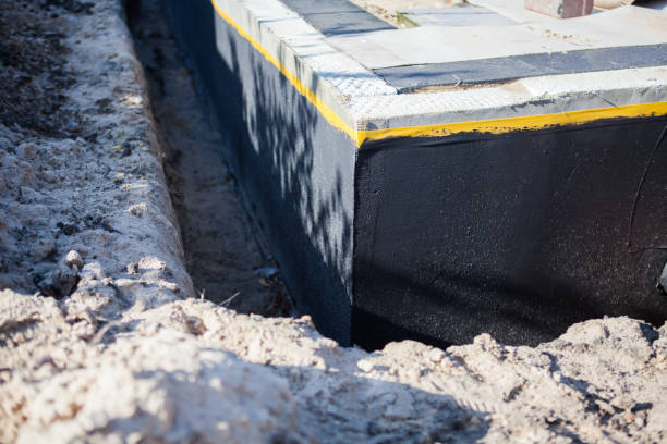 Professional Waterproofing technician working in Midway, NC